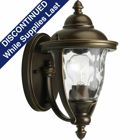 One-light Small Wall Lantern with stately traditional style, classic roof lines and unique cast yoke straps. Water glass urn shades with an Oil Rubbed finish.