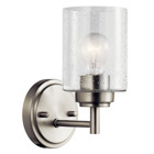 The modern Winslow 1-light wall sconce in a Brushed Nickel finish with Clear Seeded glass shade pair beautifully with the linear arms, bringing light and dimension to a space.