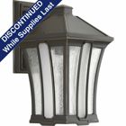 Featuring an updated bungalow design style, Twain's medium wall lantern offers visual interest for a variety of home exteriors. Seeded glass panels with center glass panel frosted to soften appearance of light and is finished in an Antique Bronze. Open bottom design allows easy access to replace lamps.