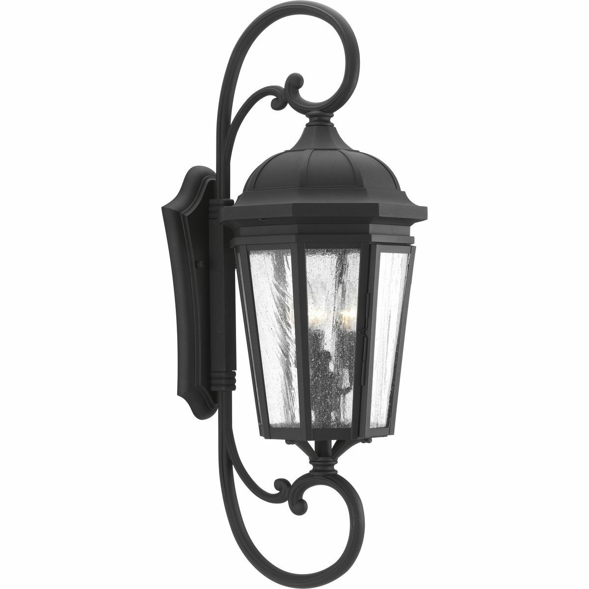 The three-light wall lantern in the Verdae collection offers traditional styling for a variety of exteriors. Classic and formal clear seeded glass complements a Black finish. Hinged door for easy access to replace lamps.