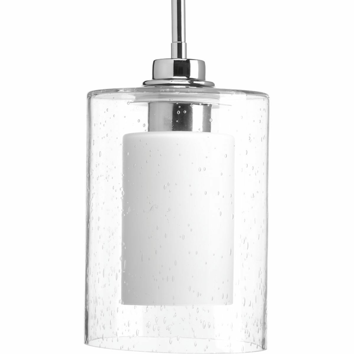 Create a focal point with the Double Glass mini-pendant's vintage-inspired silhouette. Oversized clear seeded outer glass with an inner etched white glass shade complements linear forms in a Polished Chrome finish. Polished Chrome finish. Polished Chrome finish.