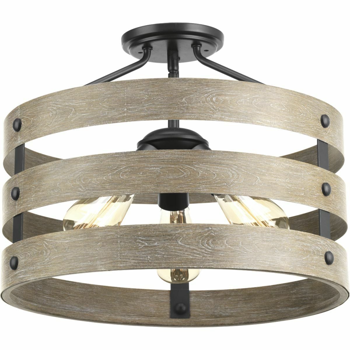 Three circular bands wrap together to create an open design in Gulliver. Hand painted to emulate weathered driftwood, the three-light semi-flush convertible's Graphite frame is accented by smooth knobs and encases exposed bulbs. The wood grained texture complements rustic farmhouse home decor.