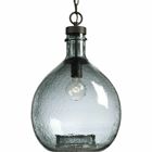 Inspired by a beautiful wine cask design, the Zin pendants are artfully formed from one large piece of glass. The one-light pendant has a Antique Bronze finish with solid, recycled blue-tone textured glass. Create a customized look for Rustic Farmhouse and Modern Farmhouse to Urban Industrial settings by grouping several pendants together in a kitchen, entryway or living room setting. Perfectly imperfect, the design offers dimension and visual texture.