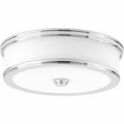 Featuring a sleek and slim appearance, Bezel LED is an architectural series of flush mount options. Etched white glass is accented by a metal trim in a metallic finish. The glass shade is illuminated on both the bottom and sides to provide a pleasing lighted effect. 13 in LED Flush Mount. Polished Chrome finish.