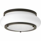 One-light 12 inch LED flush mount features architectural details for a variety of home styles. A combination of glass textures work together to create an interesting effect for today?s interiors. Metallic finishes complement the opal/linen double glass. Antique Bronze finish.