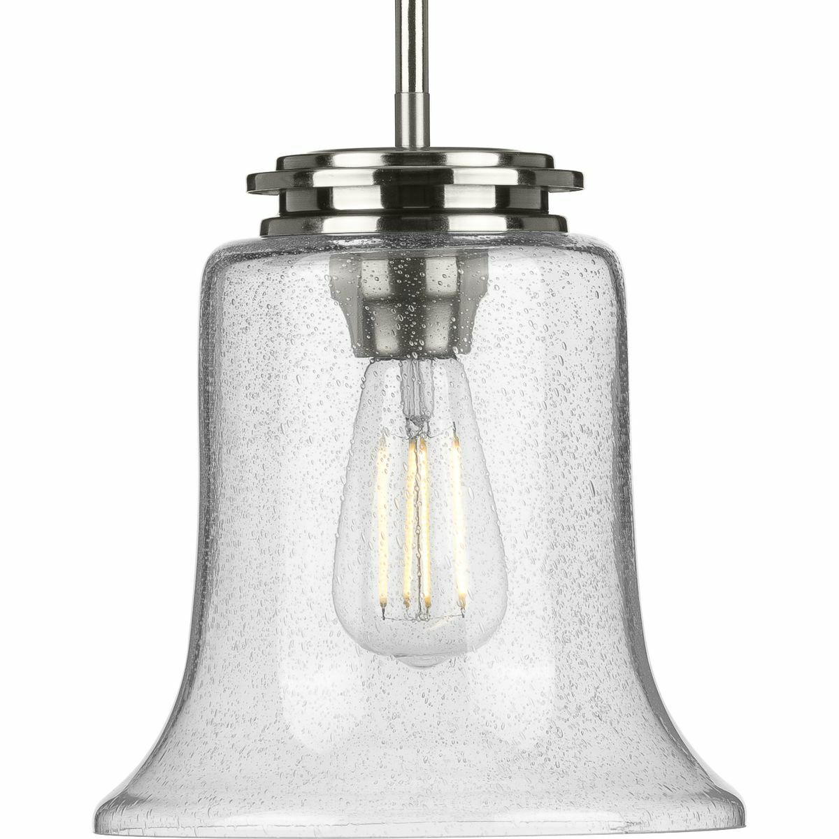 Immerse yourself in a home atmosphere primed for relaxation and inspired thinking with the beautiful craftsmanship of this mini-pendant. Savor this fresh take on a classic light choice as your gaze traces a sleek stem that extends down from a round ceiling plate to a beautiful brushed nickel light base. A lightly seeded glass shade adds an unexpected, but welcomed dash of modern personality to this clean, traditional design.