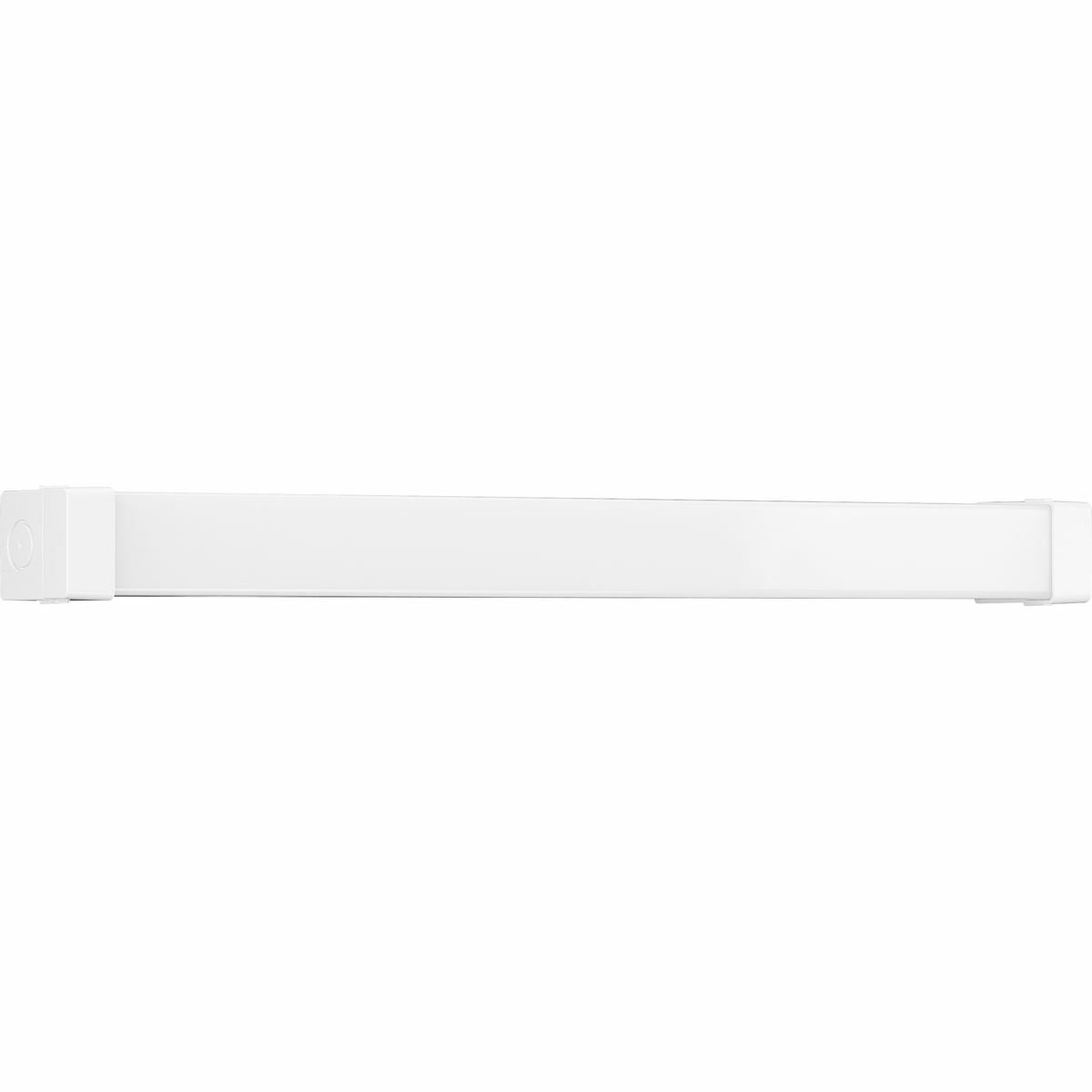 The Wrap and Strip Collection's Two-Foot LED Strip Light features a crisp white acrylic diffuser shaped into an elegant elongated silhouette. The light fixture is complemented by white end caps and a white metal chassis. The strip light can be mounted on a wall or ceiling.
