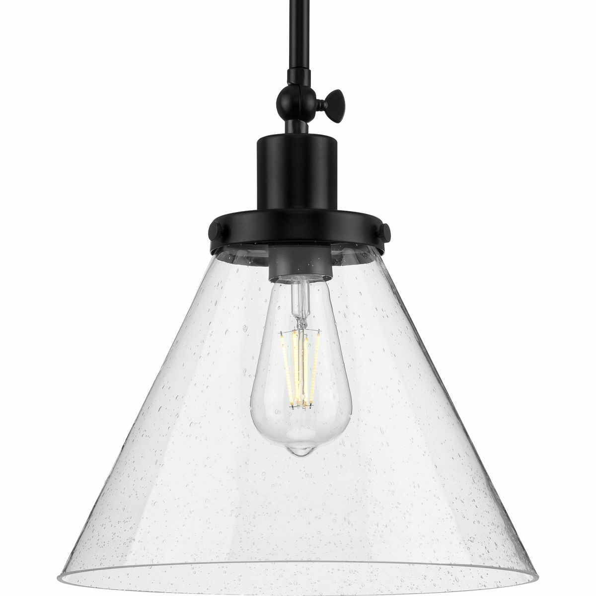 Enjoy focused task lighting with the Hinton Collection 1-Light Seeded Glass Matte Black Industrial Pendant Light. A light source glows from within a clear seeded glass shade for focused task light with unexpected visual texture. A vintage light base with round decorative knobs is coated in a sleek matte black finish for modern industrial character. The light base attaches to a metal stem that suspends from the ceiling plate.