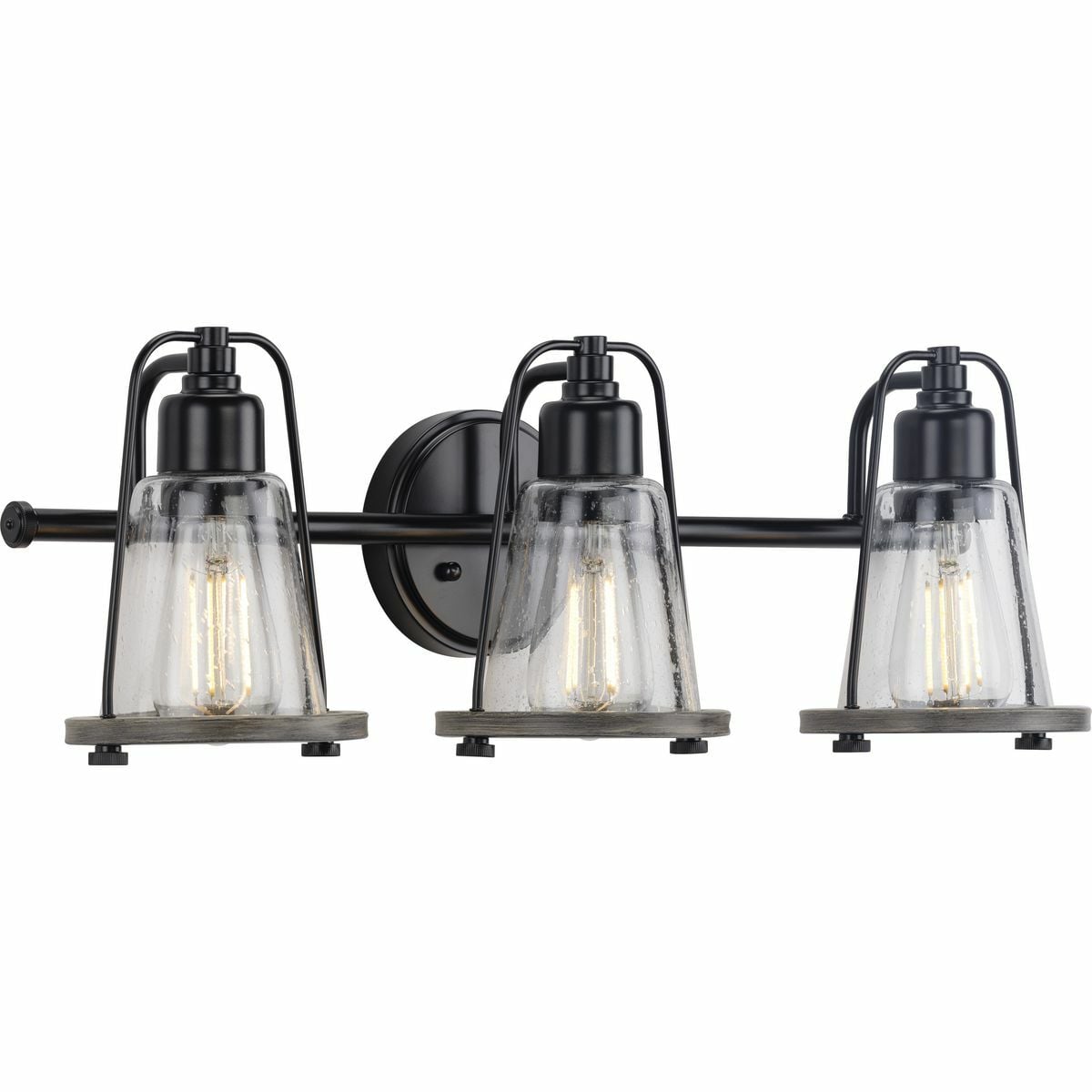 Mix old and new for charming character with the Conway Collection 3-Light Matte Black Clear Seeded Farmhouse Bath Vanity Light. A matte black bell-shaped frame and round backplate are accented by hand-painted, weathered grey wood-style accents for a charming nautical aesthetic. A light source glows from within a clear seeded glass shade for visual texture.
