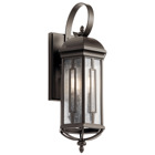 This 3 light outdoor wall lantern from the Galemore collection offers stamped metal detail and Seeded glass for a traditional look. It features a classic scroll atop the fixture and extended open cage work at the bottom.
