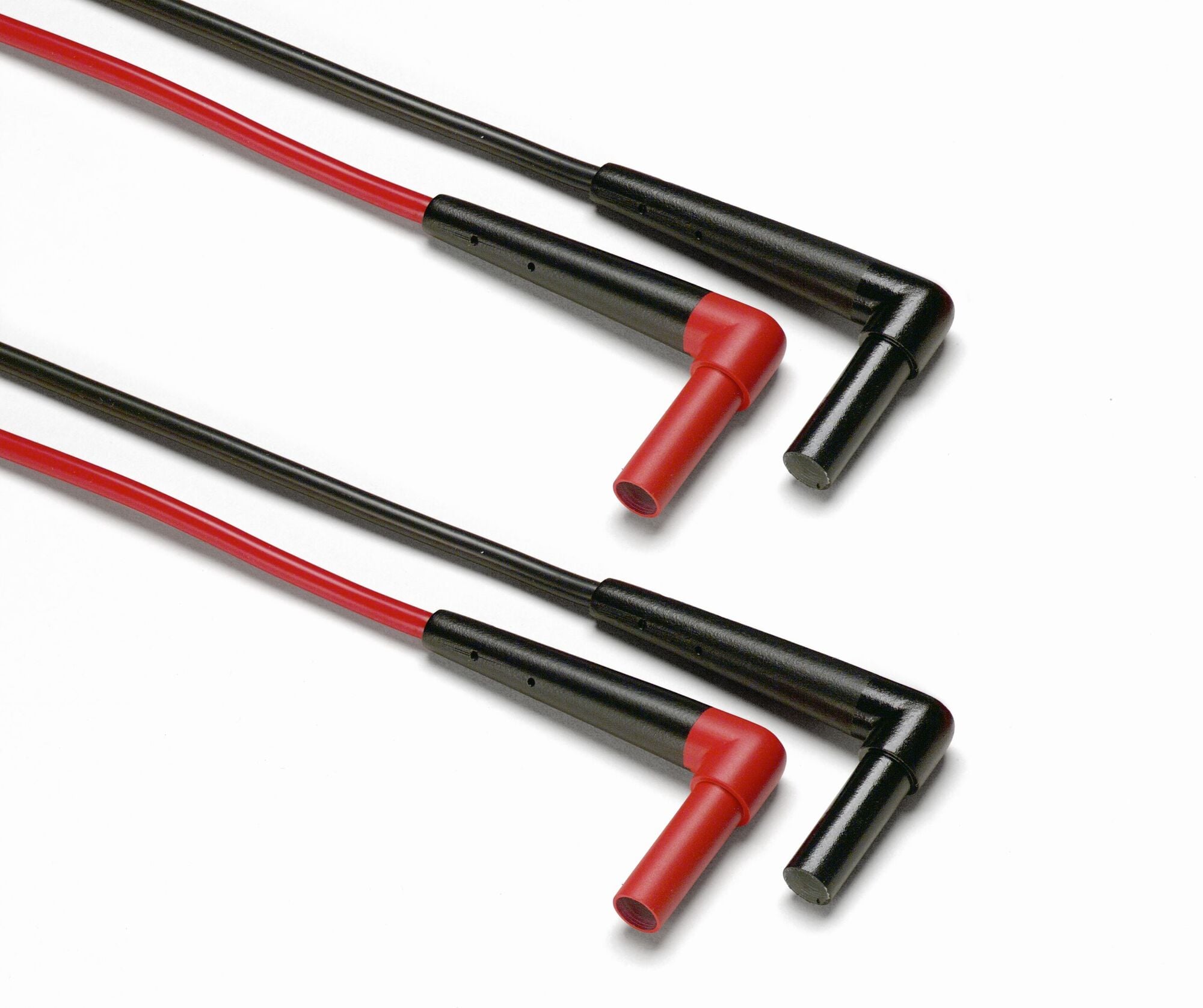 SureGrip accessories are designed to improve steadiness in slippery hands. Rubber overmolded surfaces and finger-hugging curves give the user a comfortable, reliable grip on the accessory so they can focus on making an accurate measurement. DMM test leads (red, black) with safety shrouded, strandard diameter banana plugs.  Right angle connector on both ends with reinforced strain releif.  1.5 meter silicone-insulated wire resists heat and cold. CAT IV 600V, CAT III 1000 V, 10 A rating, UL Listed
