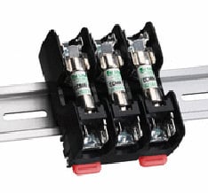 Littelfuse DIN series Class CC fuse blocks have integral DIN rail mounting capabilities that allow secure mounting to 35mm "hat" type DIN rails. New releasable mechanism allows installation and removal of block without removing adjacent components on DIN rail. Electrical panel builders and machine builders no longer need to use mounting adapters, saving assembly time and related costs.