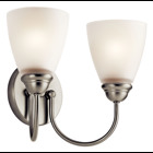 Enjoy the splendor of this Brushed Nickel 2 light bath light from the refreshing Jolie Collection.  The clean lines are beautifully accented by satin etched glass.  Jolie is the perfect transitional style for a variety of homes.