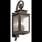 The Wiscombe Park  21.75in; 3 light outdoor wall light features an old world lantern look with its curves and clear seeded glass Olde Bronze finish. The Wiscombe Park wall light is perfect in a traditional environment.