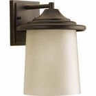 Outdoor one-light medium wall lantern with an etched umber linen glass shade in an Antique Bronze finish.