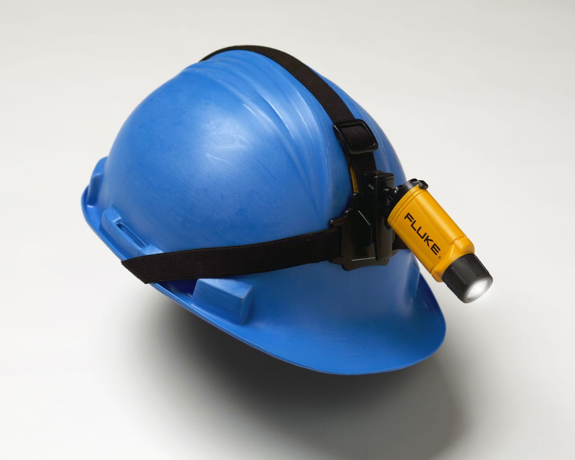Attach it to a hard hat, a baseball hat, or even a panel door for all the light you need.
