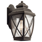 The Tangier 13.5in; 1 light outdoor wall light features a historic village look with its criss cross pattern in Olde Bronze and clear seeded glass. The Tangier wall light works in several aesthetic environments, including lodge, country and traditional.