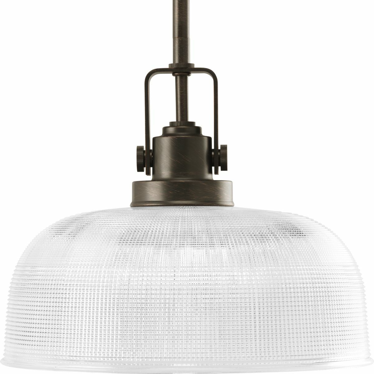 The Archie Collection brings a vintage, industrial flair to interior settings. The collection?s distinctive double prismatic glass adds visual interest as its crisscross pattern comes to life when illuminated. The distinctive finely crafted strap and knob detail adds authentic industrial flair. This one-light pendant is perfect for kitchens, dining rooms, rec room and anywhere pendants could be used. Venetian Bronze finish.