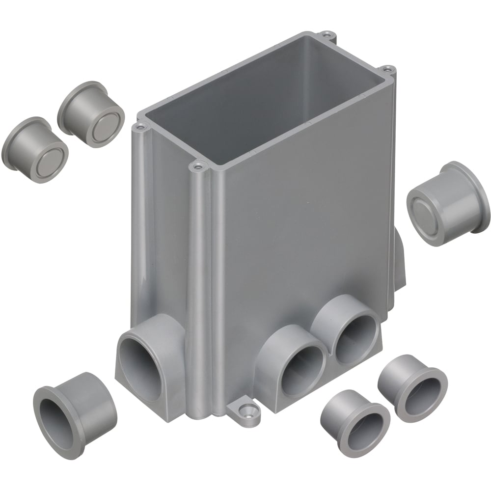 Concrete box with plugs and mud cover. Four 3-1/4 plugs, two 1" plugs.