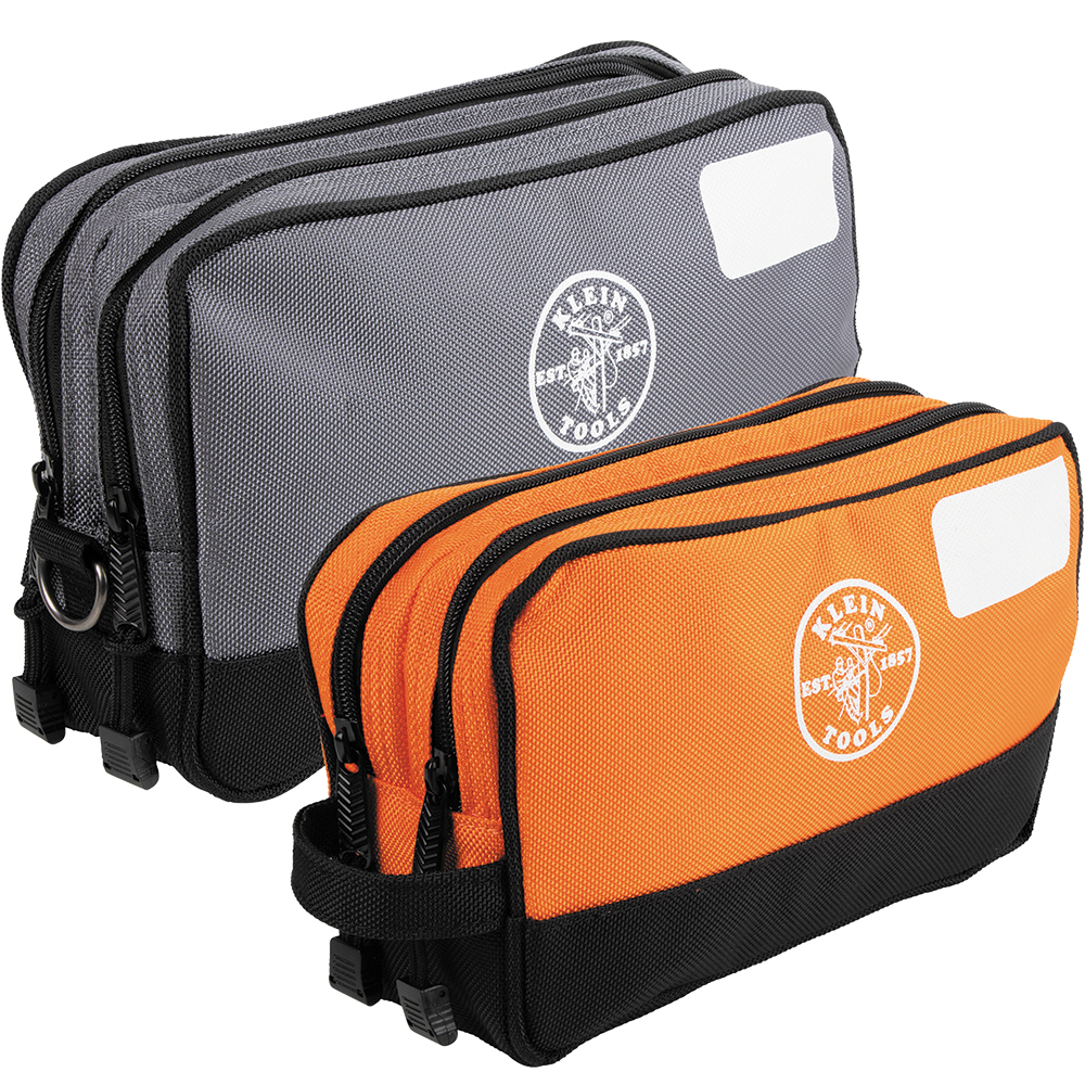 Easily access and organize tools and small parts with the Klein Tools Double-Zipper Tool Bags. These heavy-duty, water-resistant bags feature two compartments with a reinforced bottom the gray bag measures 12-Inch x 7-Inch and has D-Rings on both ends to attach carabiners or a shoulder strap and the orange bag measures 10-Inch x 6-Inch and has a handle for easy carrying. Both bags have a 3-Inch flat bottom that keeps the bag upright with a white space on front to write contents or name.