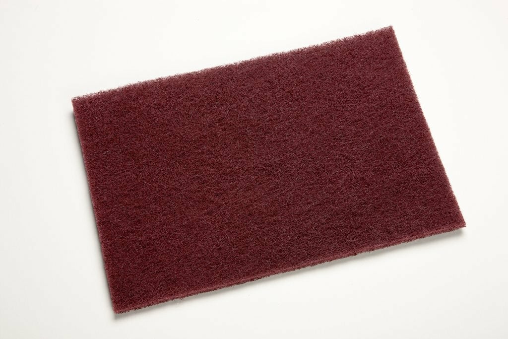 Scotch-Brite? General Purpose Hand Pad 7447 combines flexibility with effective cutting action and precise hand control to accomplish tough cleaning jobs or produce fine finishing results, use after use. Very fine grade aluminum oxide abrasives cut fast and fine, leaving a smooth, finished surface. Suitable for use on a wide variety of materials and for many different tasks.