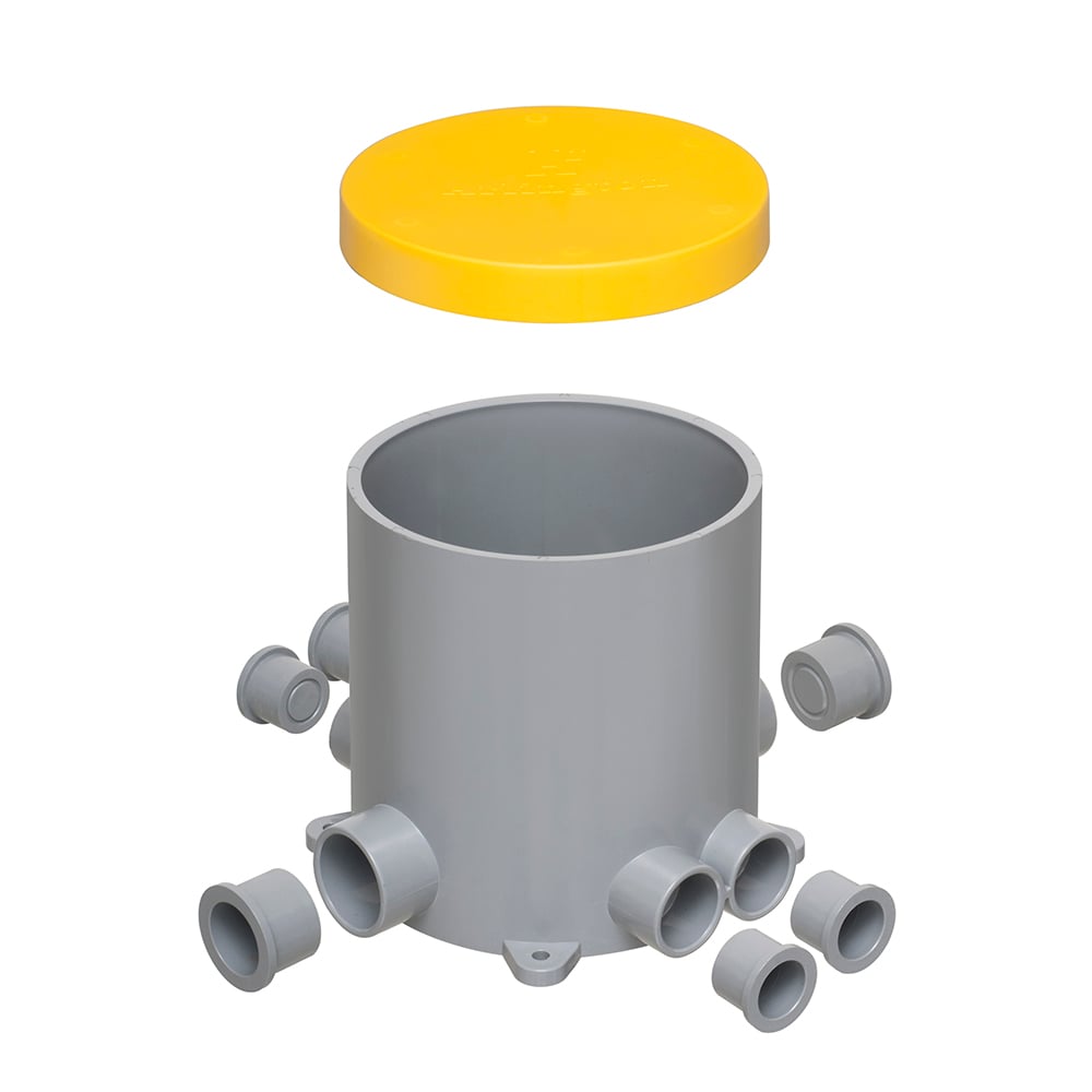 Heavy-duty plastic. 5.5 inch non-metallic concrete floor box with six conduit hubs, four plugs, and multiple slots for positioning two low voltage dividers in the box.