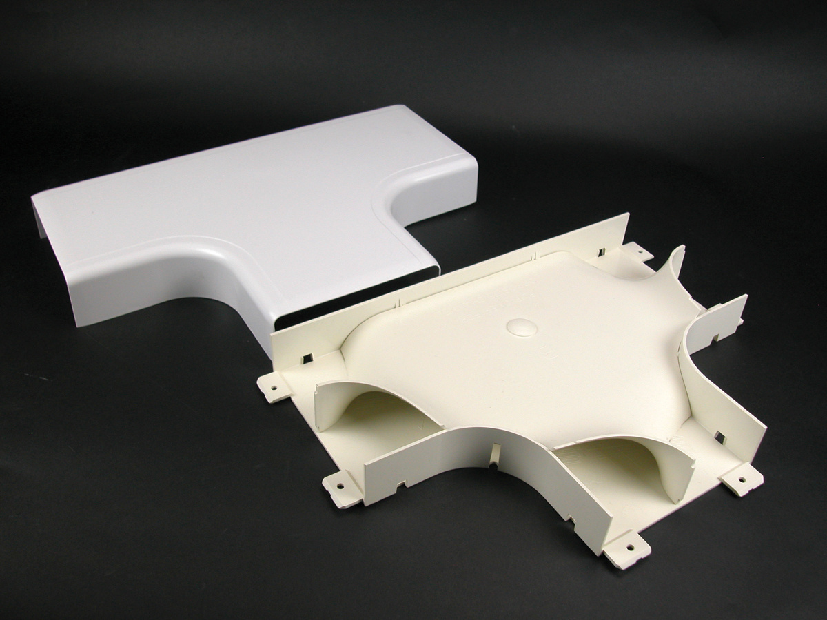 A full capacity tee fitting for branching raceway at right angles. Provides separation of services and 2" (51mm) cable bend radius for UTP and Fiber Optic installations. White